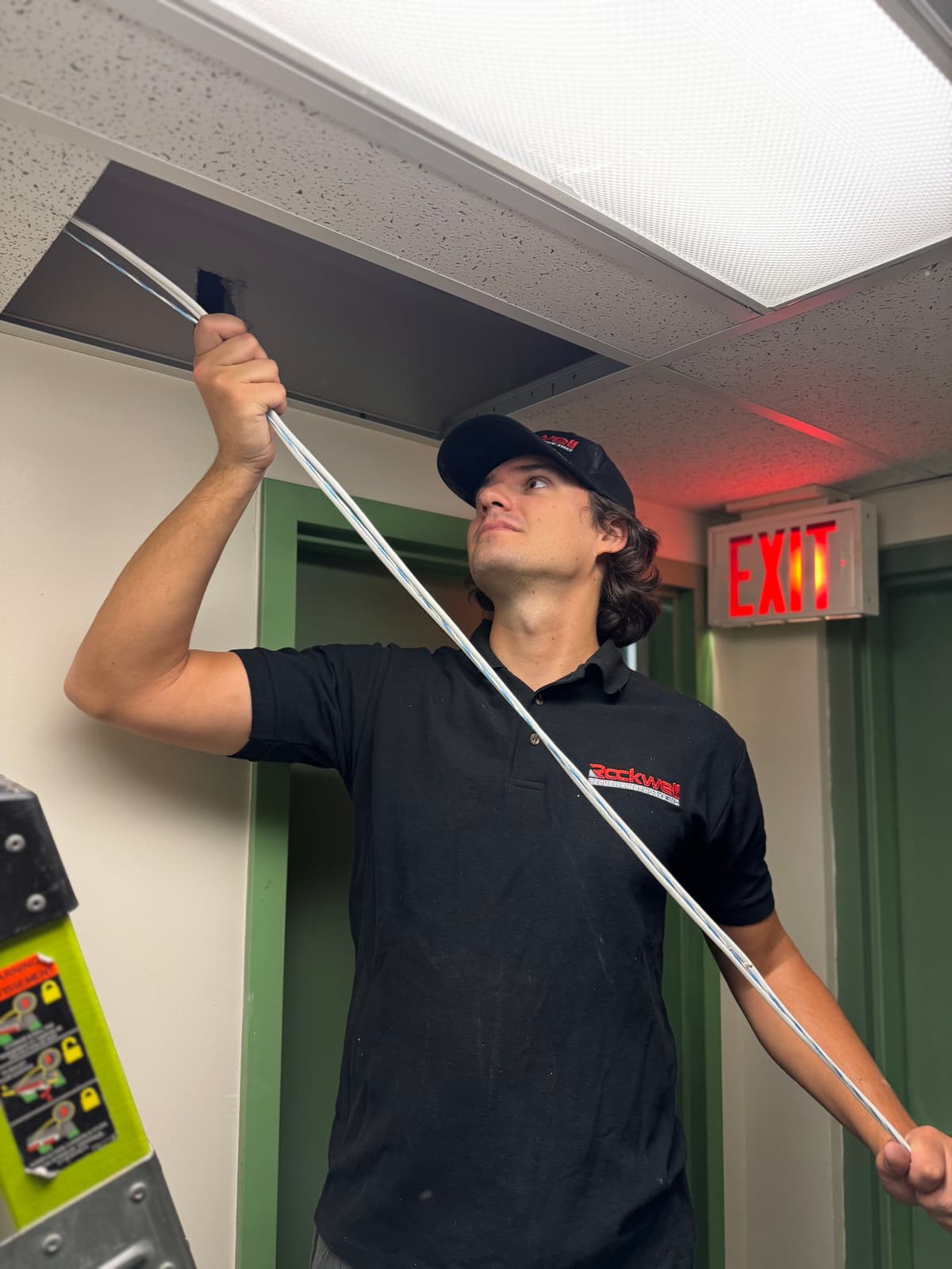 Rockwell Security Networks technician performing commercial security installation in Toronto